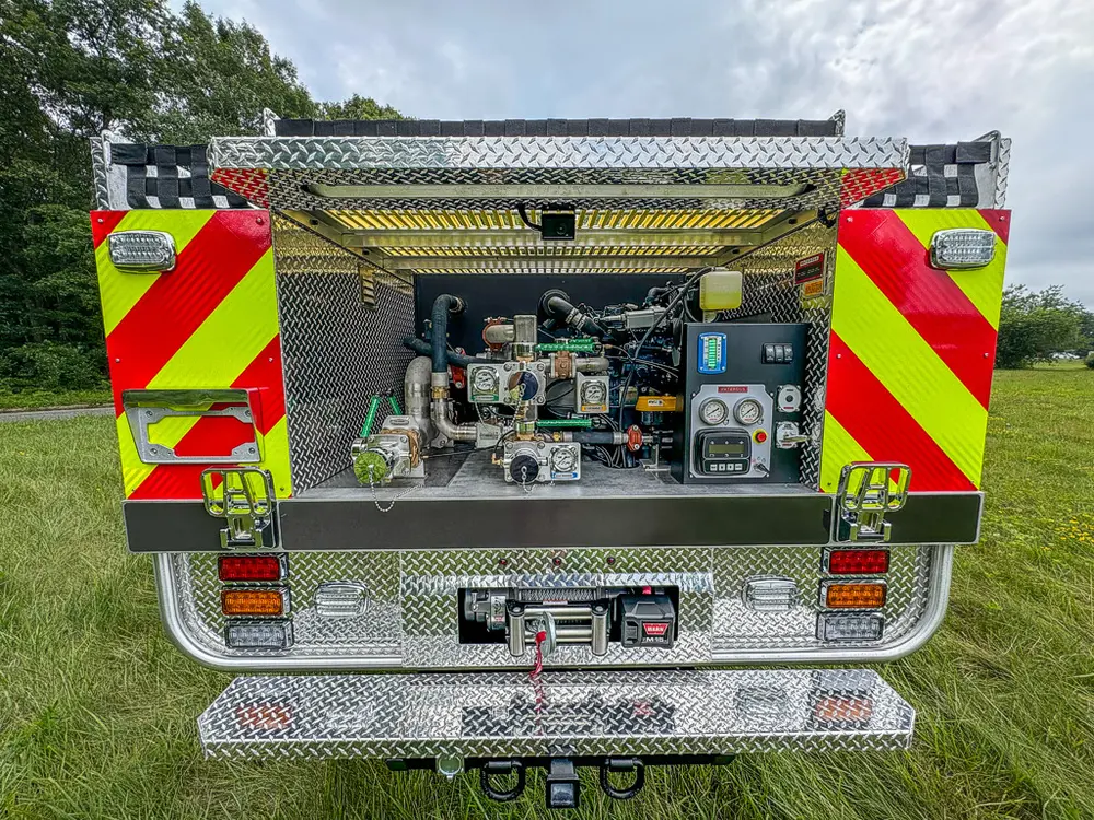 Straight rear pump panel view with controls, gauges, and chevron striping.
