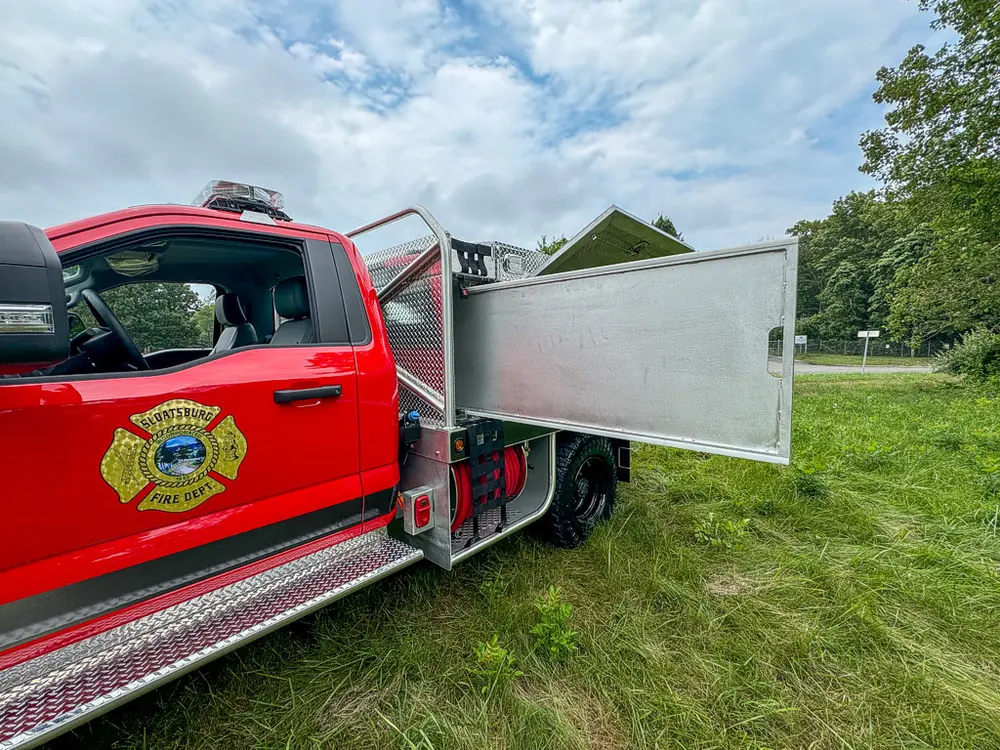 Right-side profile with one long compartment door open.