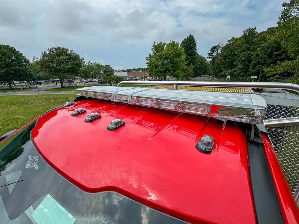 Cab roof close-up with marker lights and side roof rail.