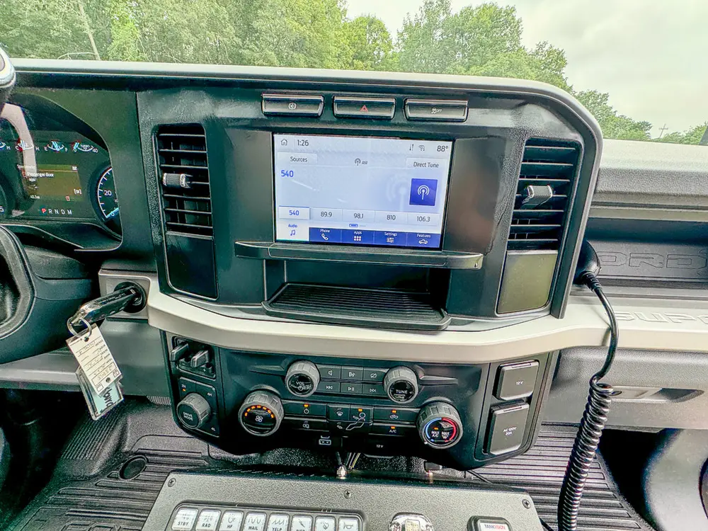 Dashboard center display and climate controls close-up.