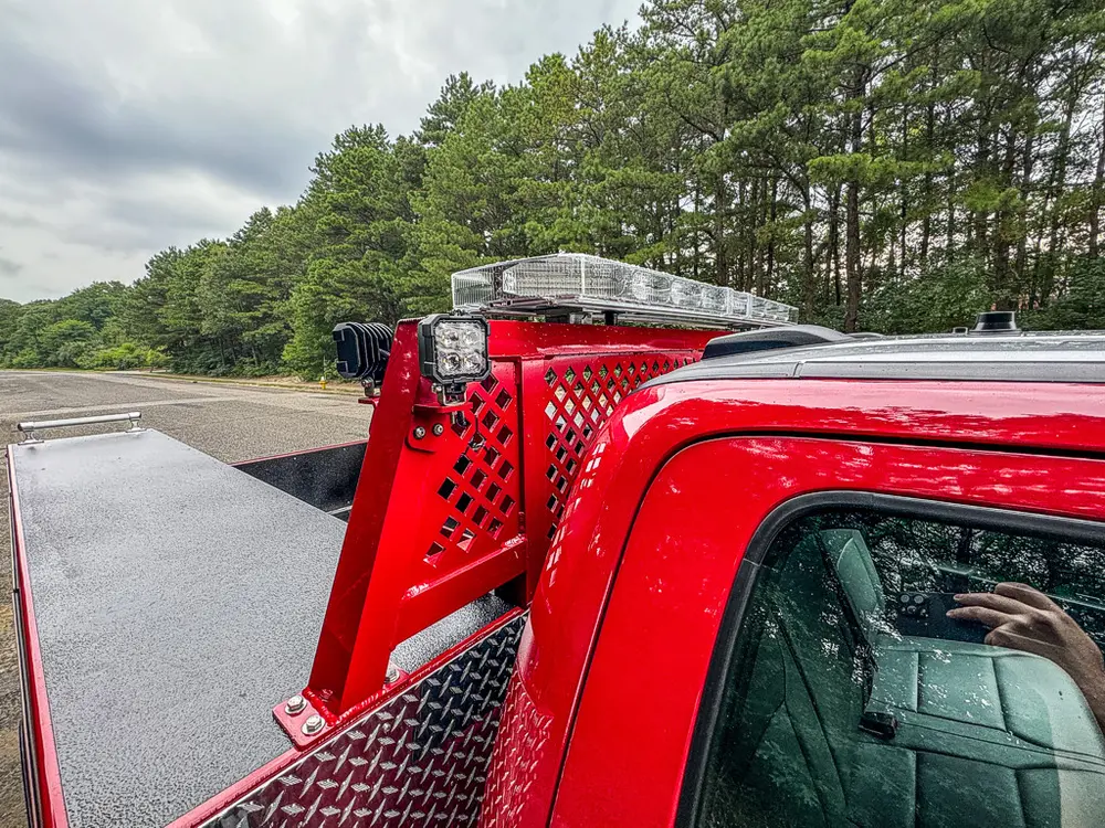 Rear upper rack and side panel close-up behind the cab.