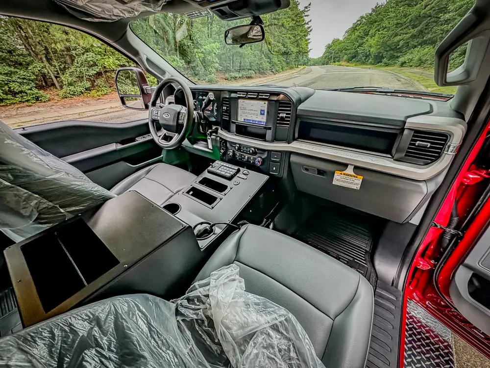 Passenger-side front interior view with dashboard and center console.