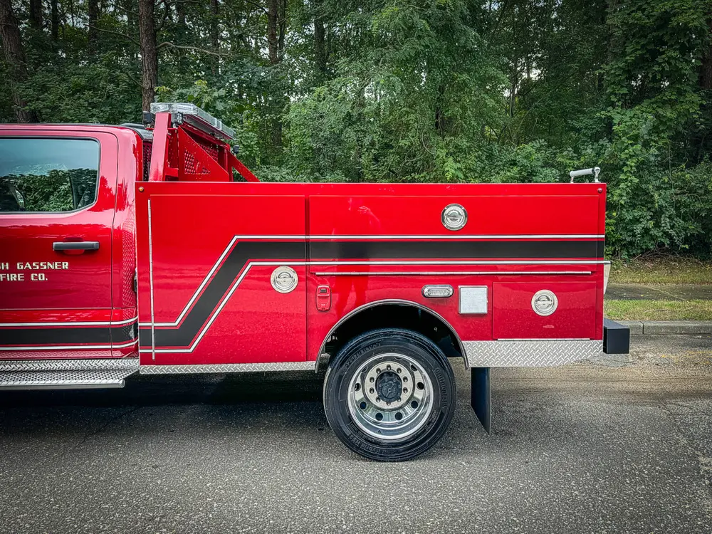Right-side mid-body close-up with closed compartment doors.