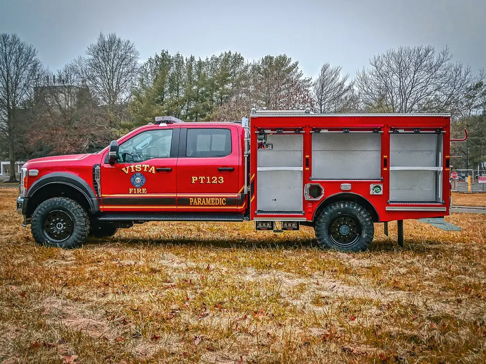 Wide left-side view with all visible compartments open.