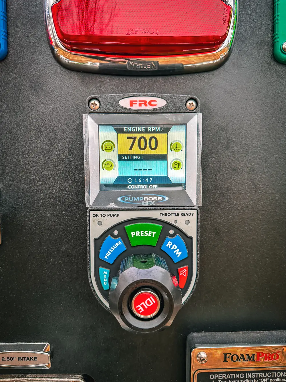 Engine control module close-up on the rear panel with digital display.