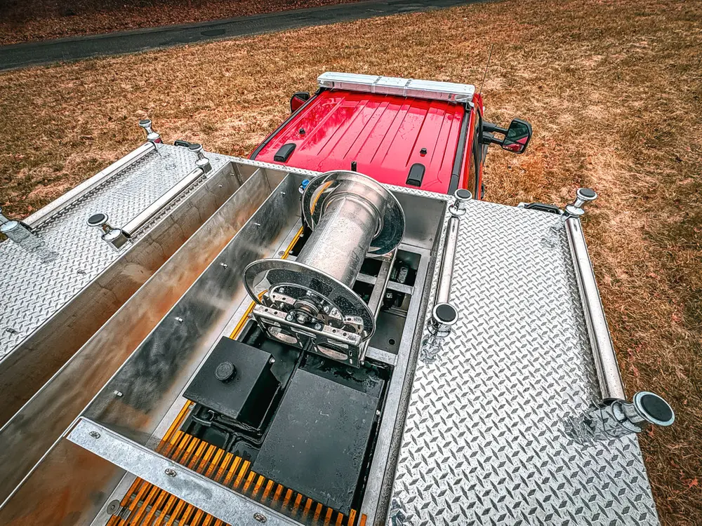 Top deck perspective from rear showing center reel and dual walkways.