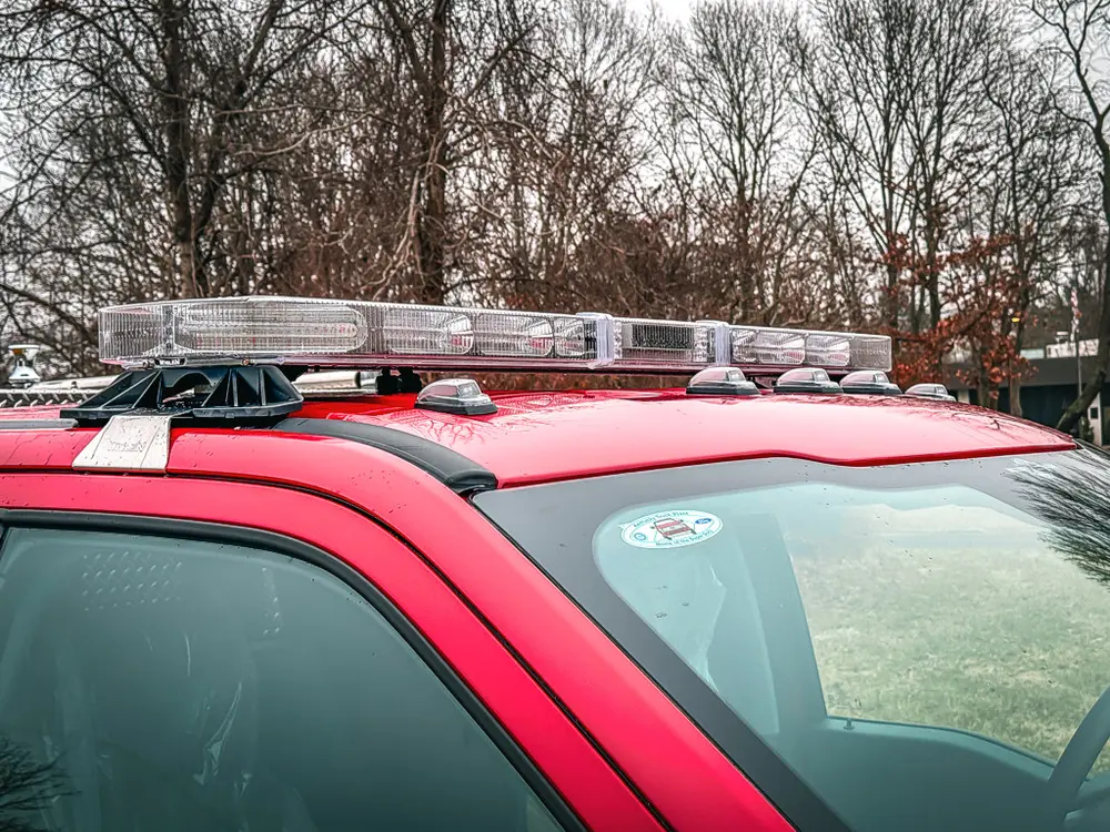 Cab roof close-up with lightbar and roof-mounted hardware.