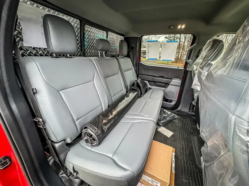 Rear bench seat close-up with fold-down center section.