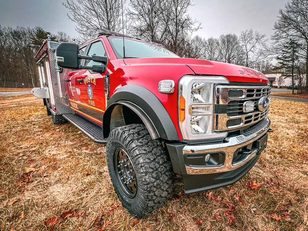 Front-right three-quarter exterior view of the truck on grass.