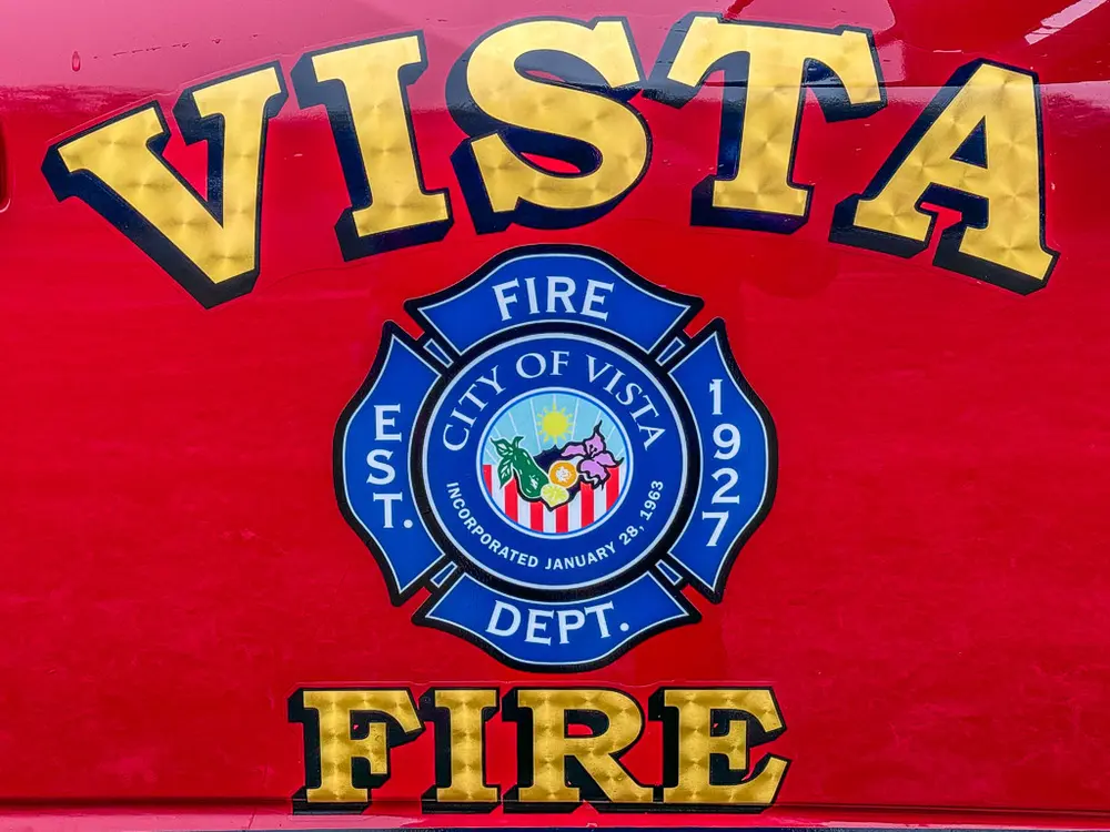 Door graphic close-up with Vista Fire Department emblem and text.