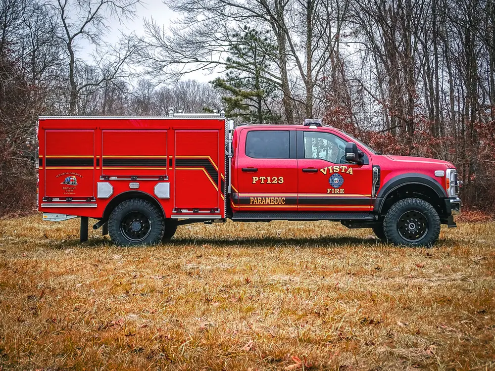 Left-side profile with all side compartment doors closed.