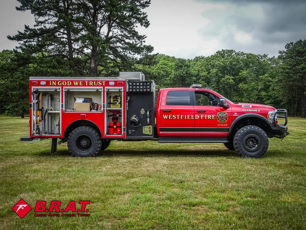 Side view with rear body compartment doors open and cab profile visible.