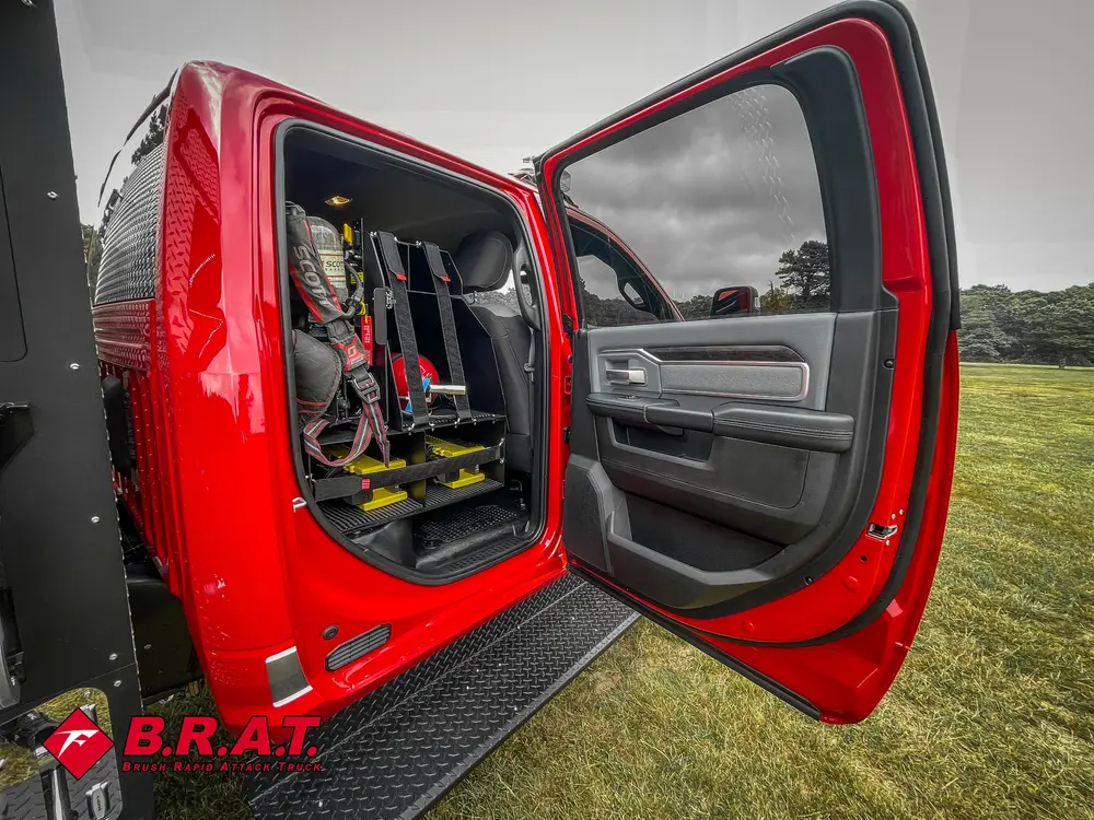 Open rear cab door view showing rear seat and interior door panel.