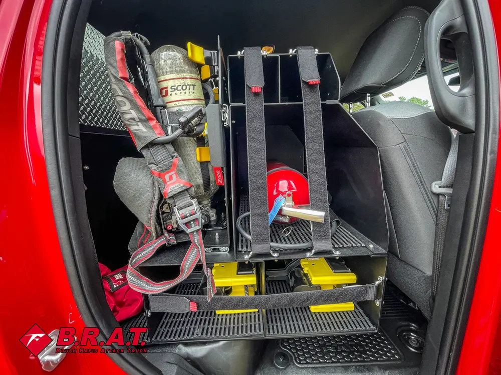 Rear seating close-up with mounted equipment and floor platform.