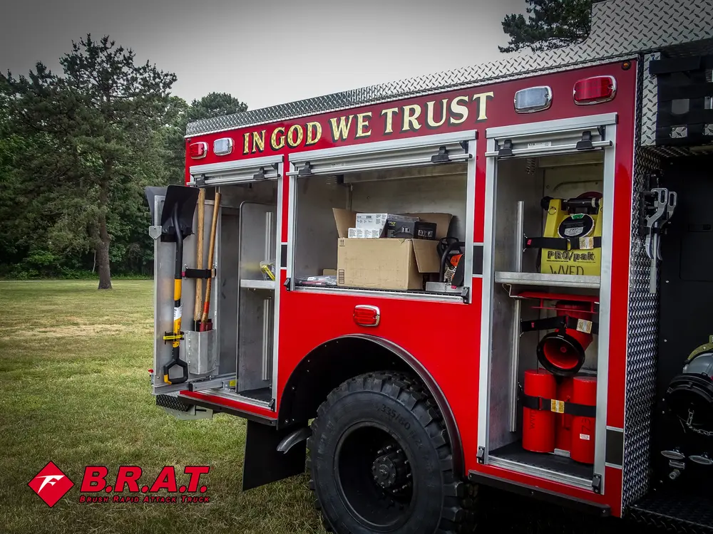 Open side body compartments revealing shelves, pump tools, and storage bins.