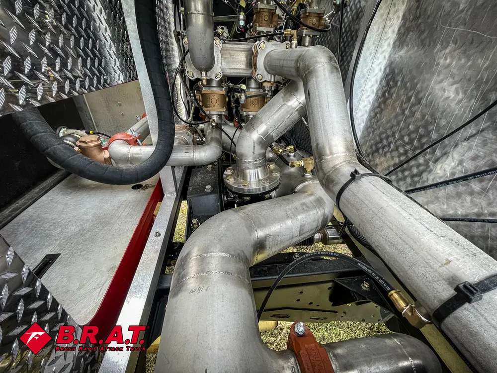 Pump area close-up with large pipes and mechanical components.