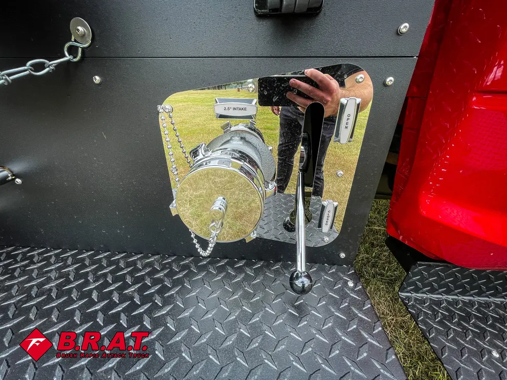 Side panel close-up with capped outlet, chain, and mounting bracket.