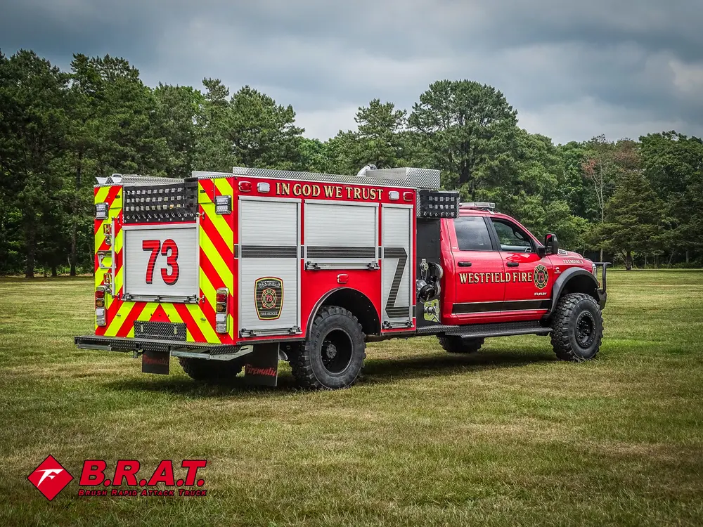 Rear-right three-quarter view showing chevron rear panel and side body.