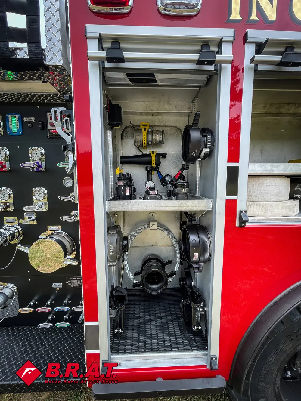 Pump-side compartment with gauges, valves, and mounted tools visible.
