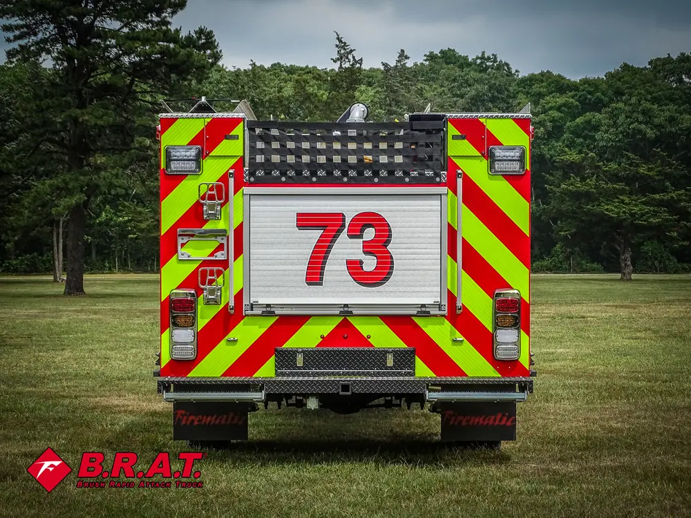 Straight rear view with chevron striping and large 73 panel.