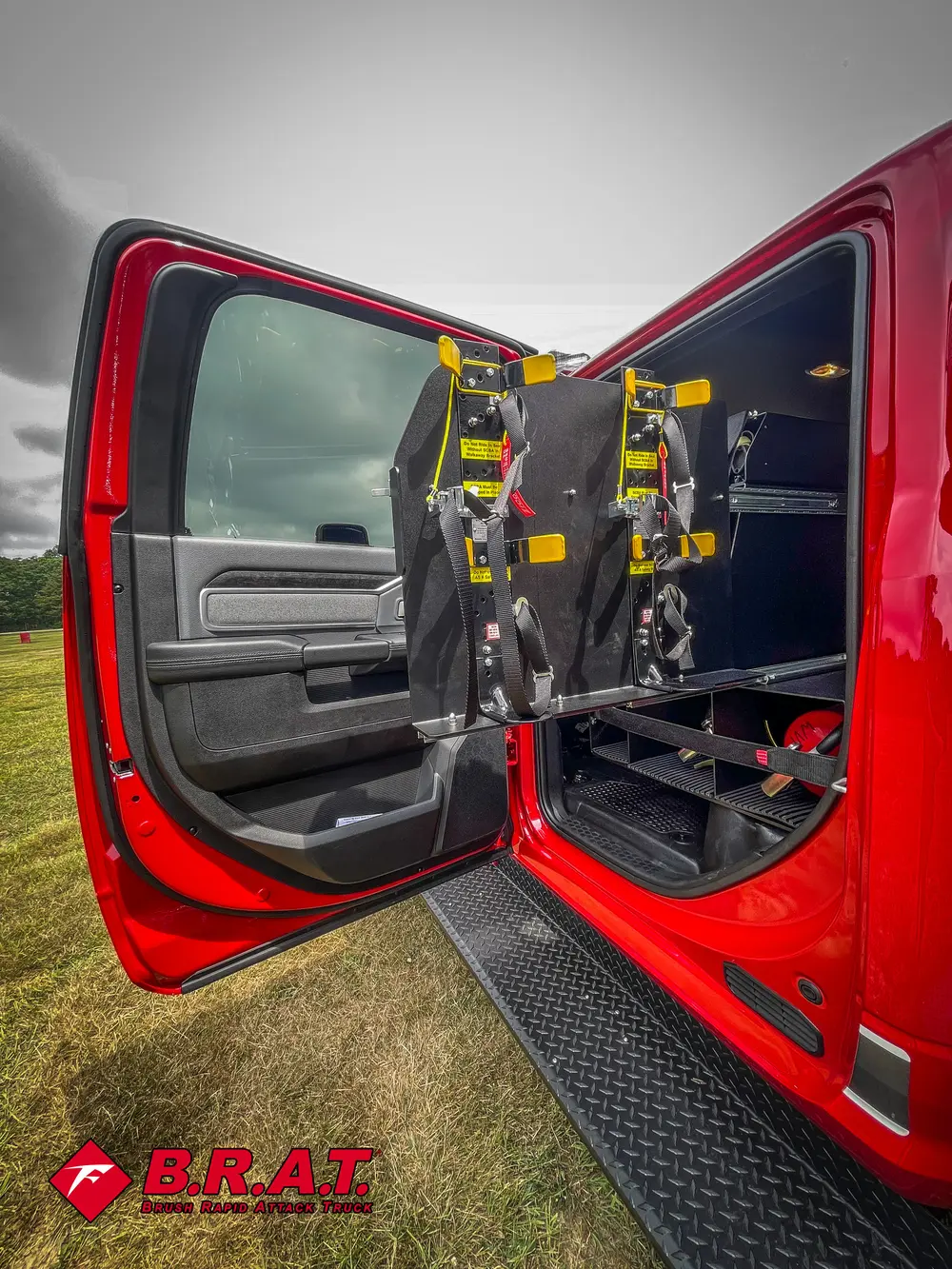 Open rear cab area with mounted tool boards and side panel.