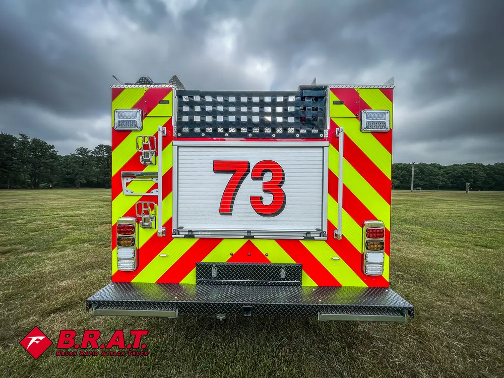 Rear-left three-quarter view with side body and rear panel visible.