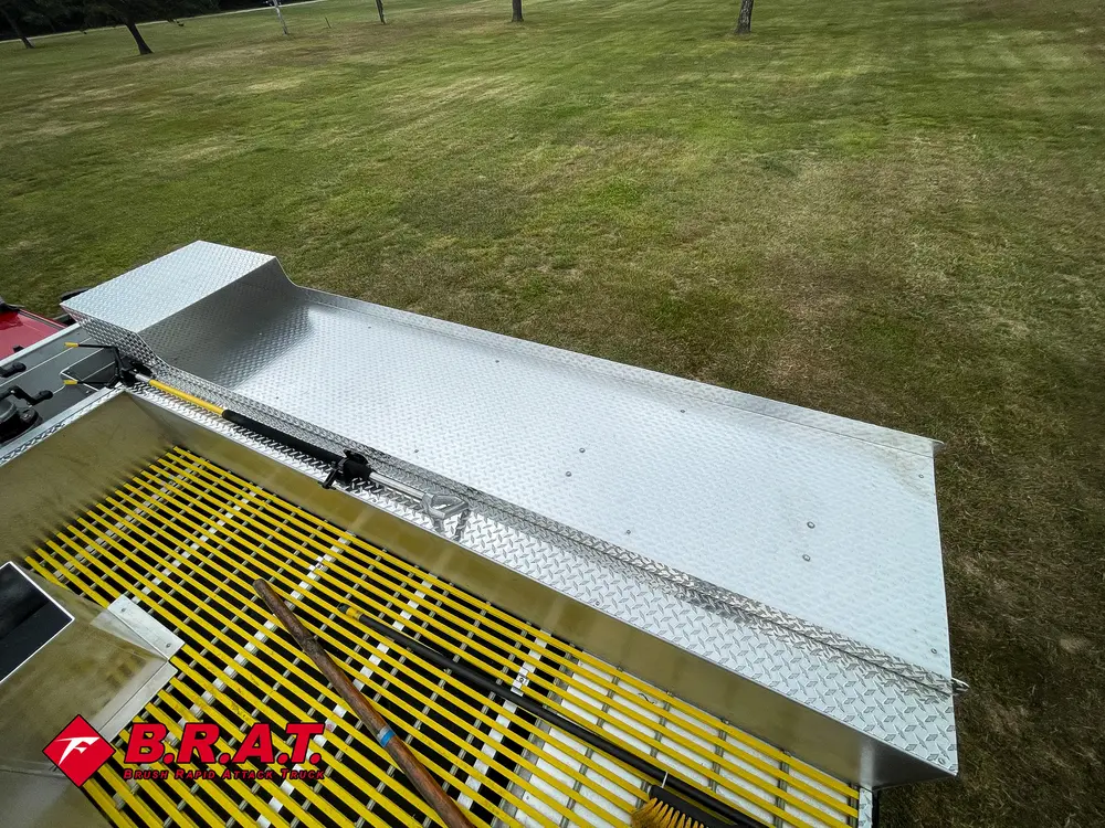 Upper deck side view with fold-down panel above yellow grating.