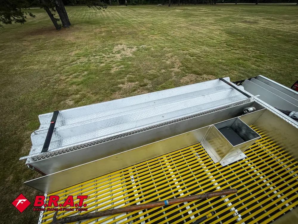 Top walkway close-up with yellow grating and side rail trim.