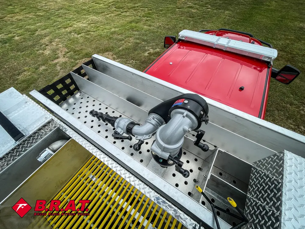 Top deck front section with mounted nozzle assembly and control linkage.