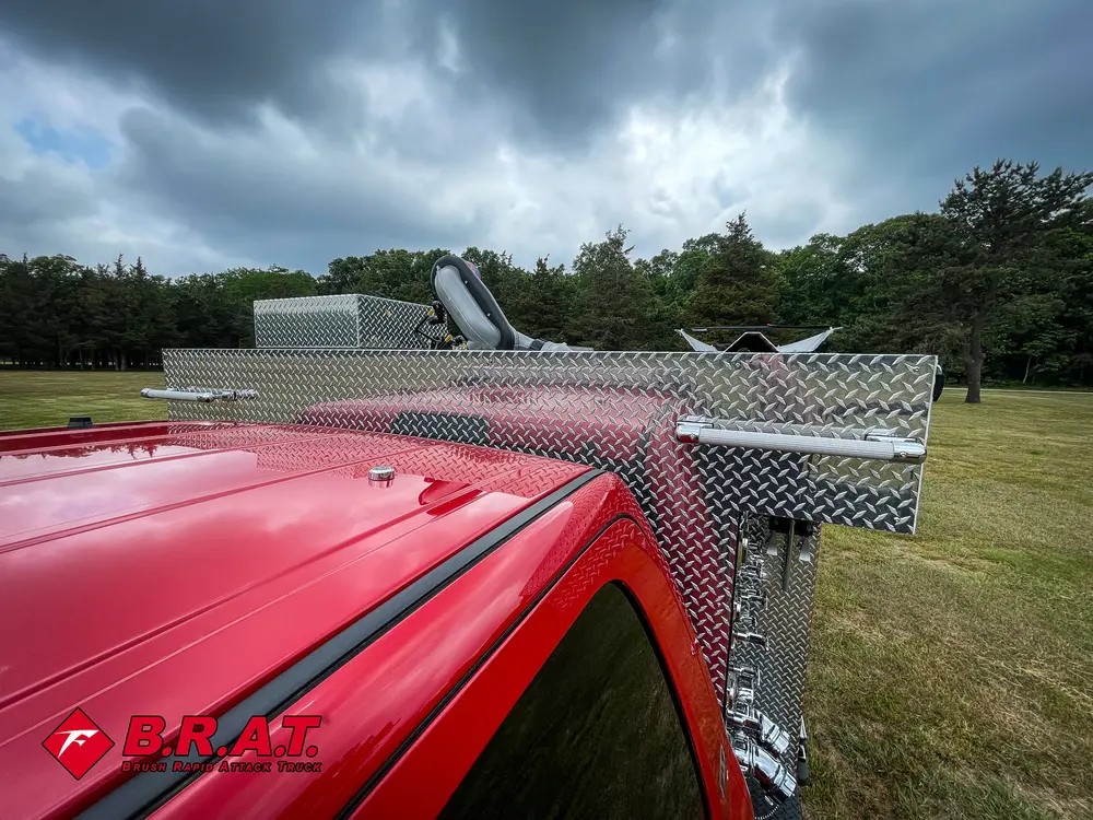 Top deck view toward cab roof with rail and mounting hardware.