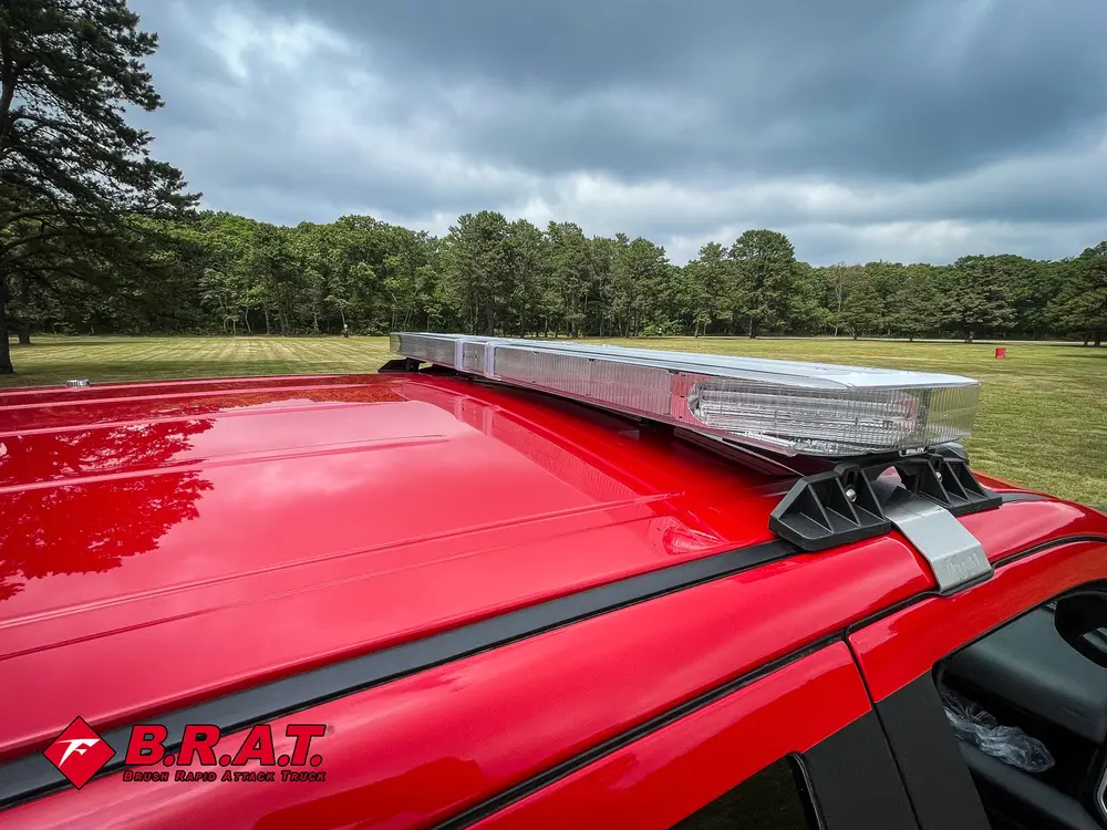 Rear section of cab roof with mounted panel and roof vents.