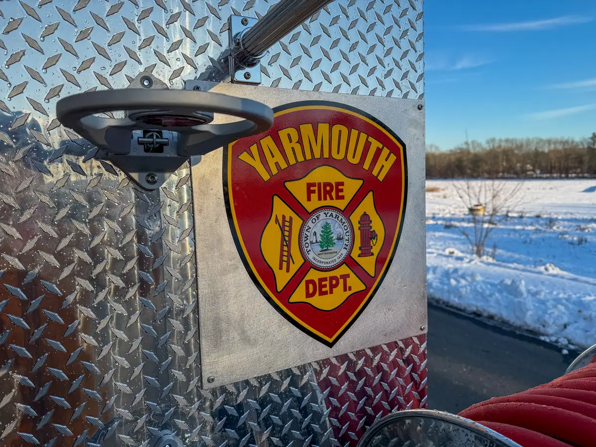 Close-up of rear panel area with shield plate and work-light mounting point.