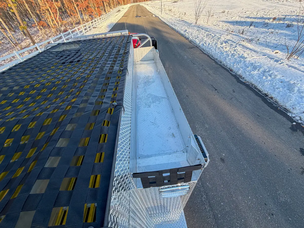 Top view along the right hosebed walkway beside the netted hosebed.