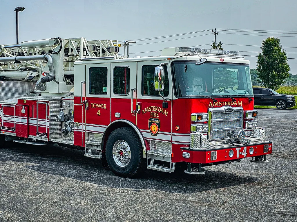 Tower ladder truck front-left exterior profile showing full body