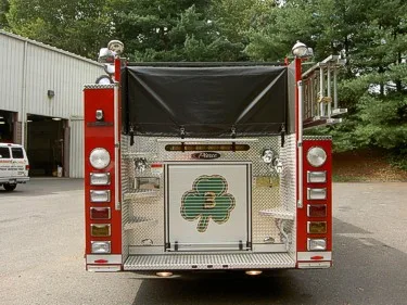Rear view showing rear panel, warning lights, and rear hosebed area