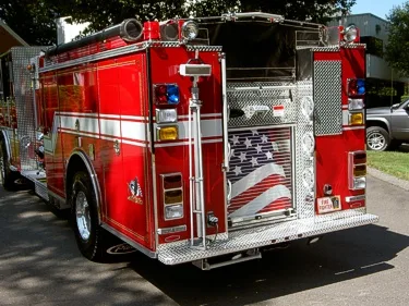 Rear-right exterior view showing side compartments and rear body panel