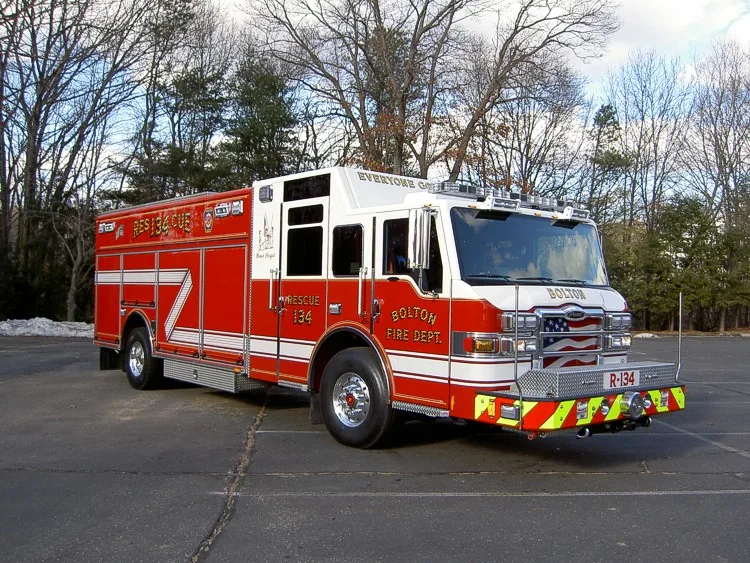 Front-right exterior view showing cab and side body compartments