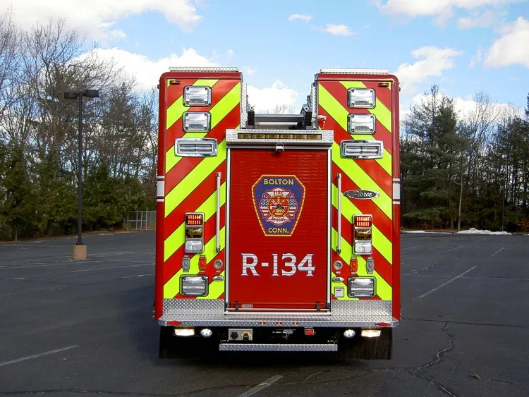 Rear view showing chevron striping and rear body panel