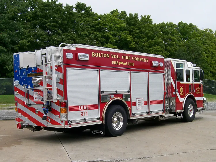 Rear-left exterior view showing side body and rear chevrons