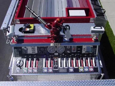 Top deck control panel close-up showing switches and valve handles