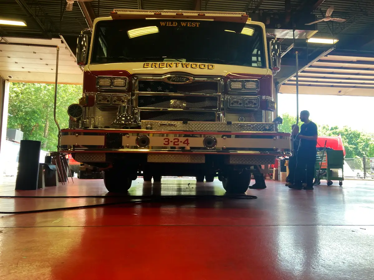 TAK-4 suspension badge close-up on cab side panel
