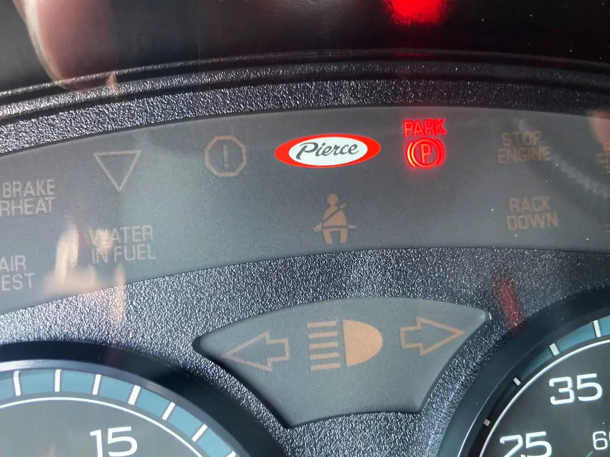 Custom cab emblem close-up mounted on interior trim panel