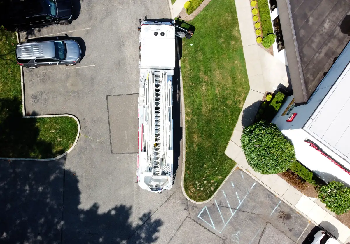 Pierce tower ladder top-down aerial view showing full apparatus length and aerial ladder bed