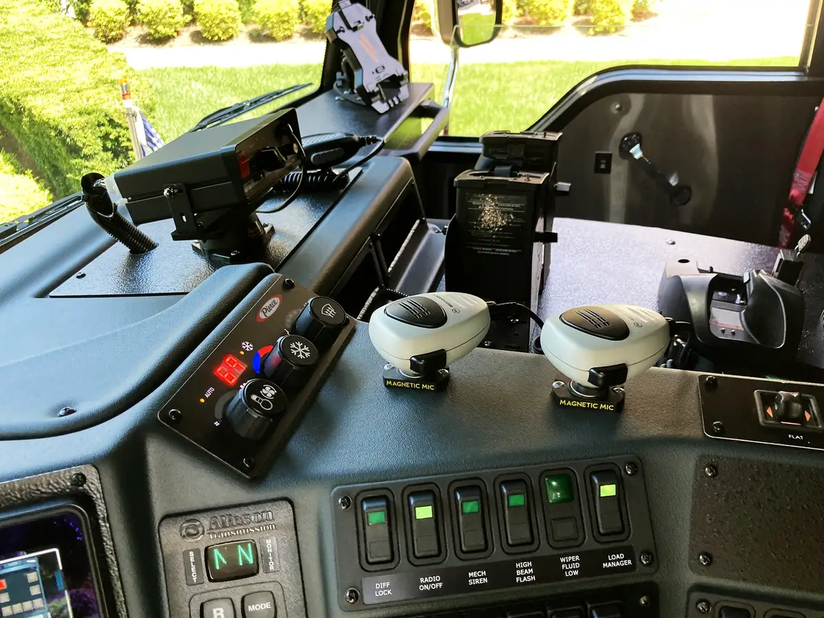 Overhead switch bank close-up showing labeled cab control toggles