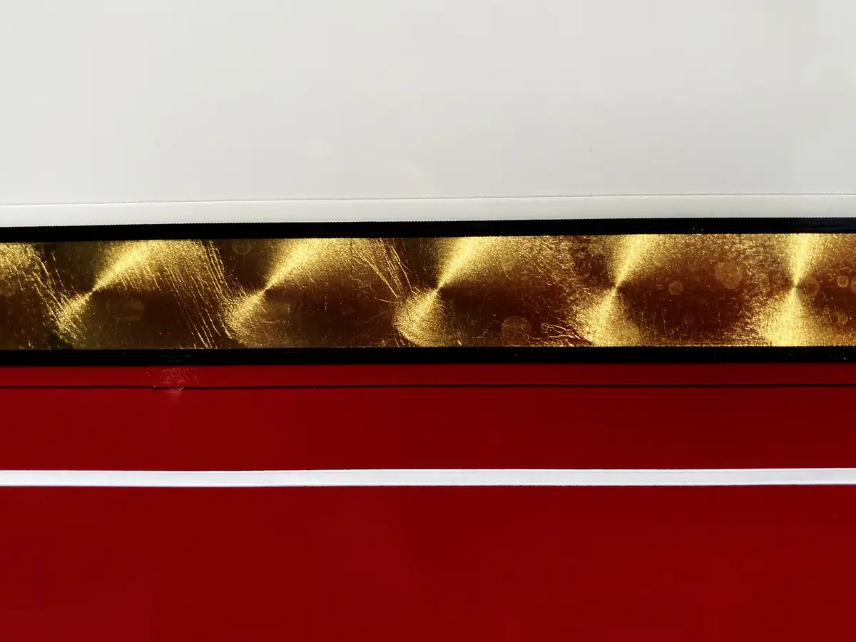 Tall side compartment open showing stacked shelves and slide-out tray