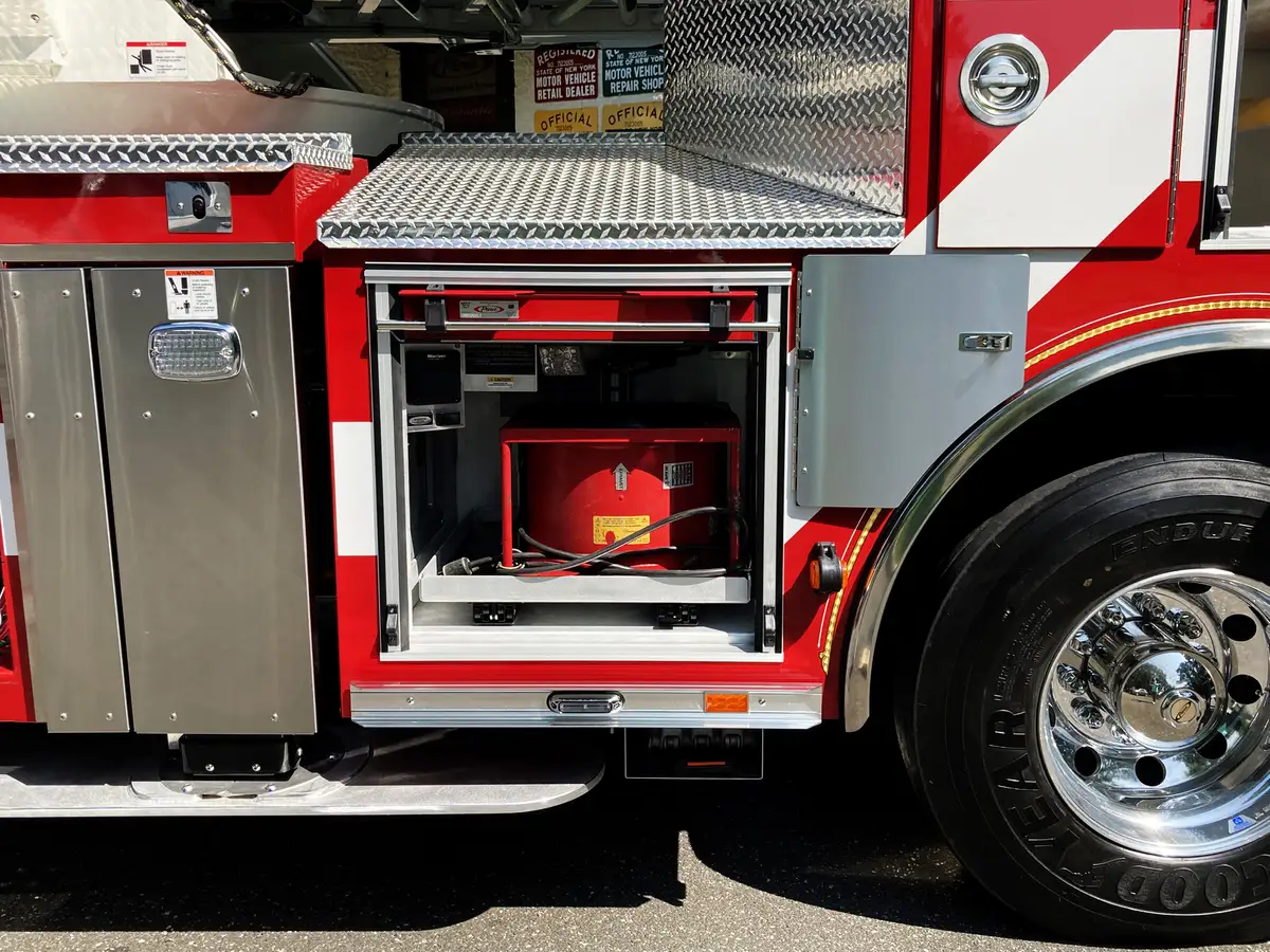 Octagonal utility access port close-up on side body panel