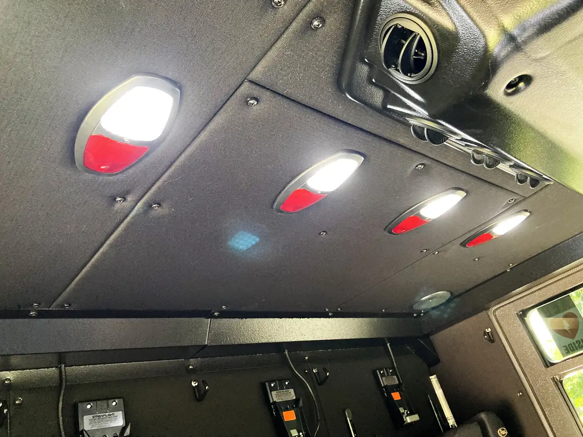 Pierce tower ladder front-left exterior view with cab, bumper, and side body