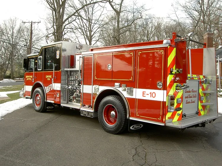 Rear-right exterior view showing side compartments and rear chevron panel