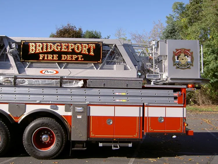 Body side lettering close-up showing Bridgeport fire department sign panel
