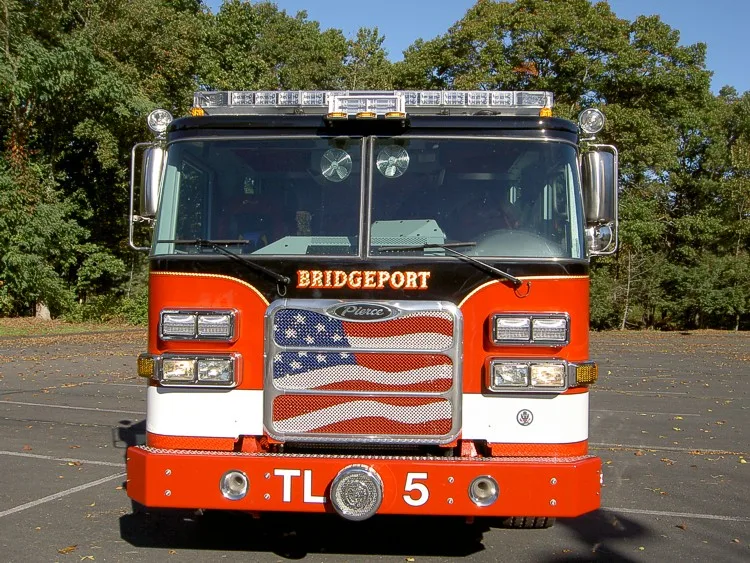 Head-on front view showing grille and American-flag style front panel